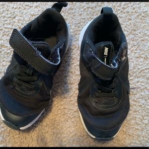 Black toddler Nike sneakers